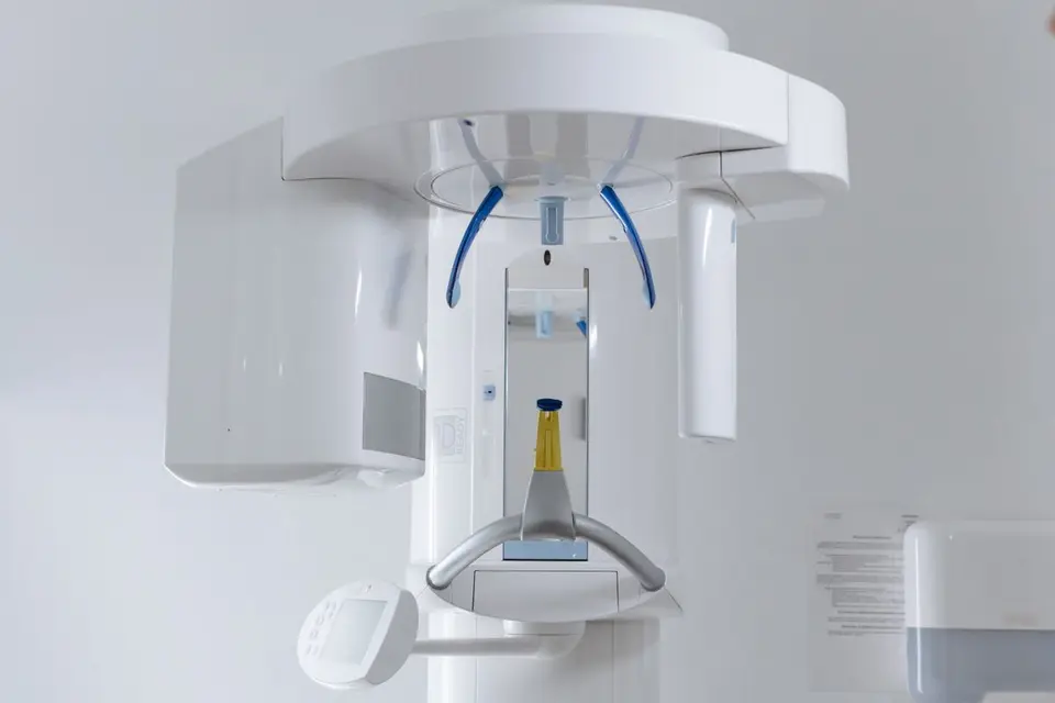 Close-up of modern dental x-ray machine in a clinic setting.